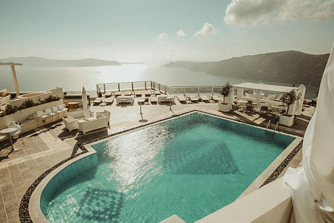 Best wedding venues in Santorini - Ultimate Guide by a local Cinematographer 16 Panoramic view of Roccabella Hotel one of the best wedding venues in Imerovigli